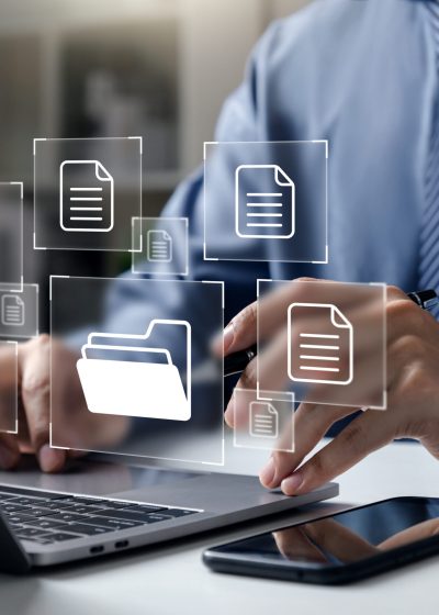 Document Management System DMS, Businessman pointing to folder and document, system used to create, store, manage, and track electronic document.